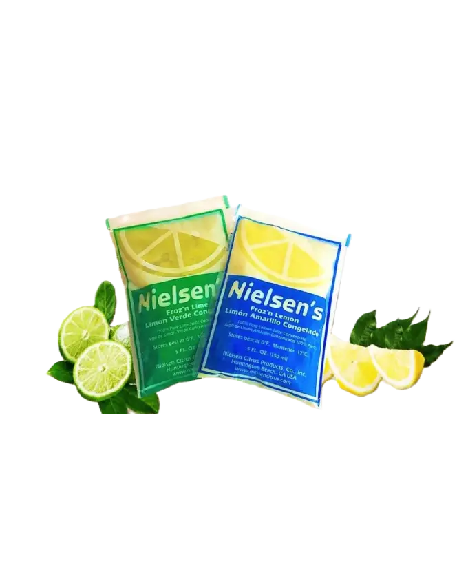 Due bustine Nielsen's di succo congelato (lime e limone) con fette di lime e limone e foglie, packaging colorato verde e blu.